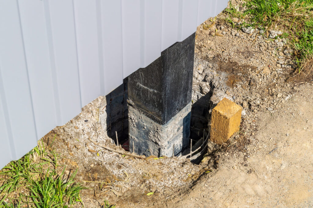 The post is dug into the ground for fence
